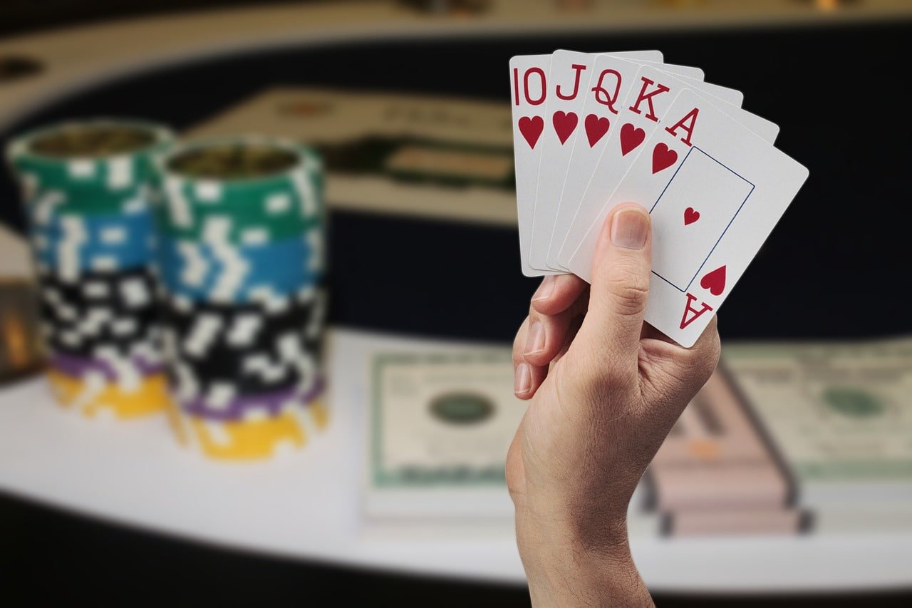 Close-up view of Sic Bo betting chips placed on various table positions
